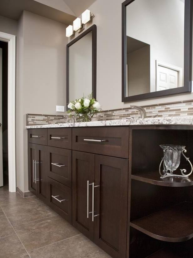 Love the dark cabinets with the light marble and tile