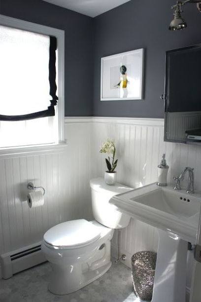 Small bathroom idea with coral stone veneer on the wall [Design: Gary J Ahern