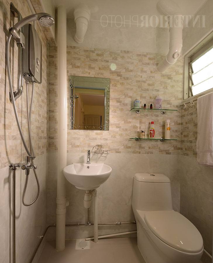 Opt for a curved shower enclosure in this instance as it takes up less room compared to an angled one