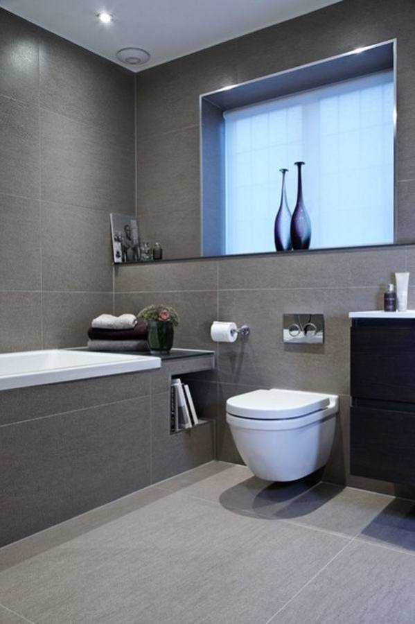 white washstand next to white acrylic latrine connected by glass shower room with stainless