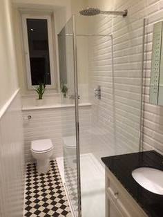 This complete apartment renovation in a Victorian tenement in Glasgow included fitting a sleek new bathroom into a long and narrow room