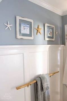 Stone shower, floating shelves, shell decor