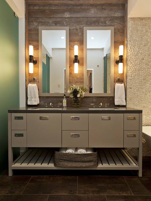 Breathtaking lighting and beautiful vanity give this bathroom a relaxing and refreshing atmosphere