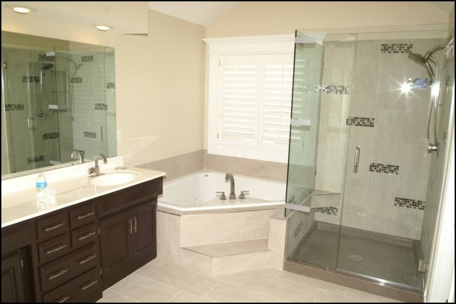 Small bathroom with tub and legged vanity