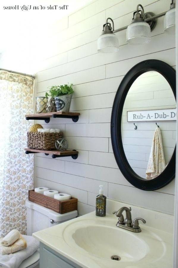 I love the shower head and the wooden beans in this bathroom