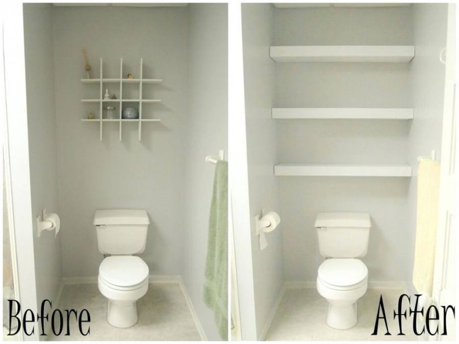 Floating shelf for above toilet with a framed quote, mason jars, and flowers