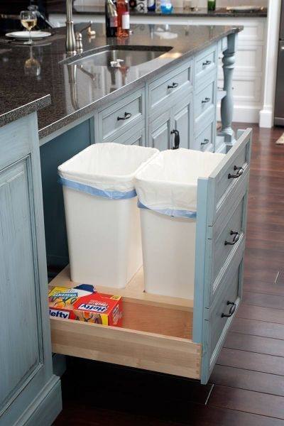Curvy corner drawers steal the show in this kitchen [Design: Grace Blu Designs]