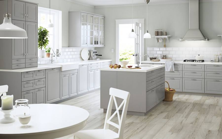 A white kitchen with green accents