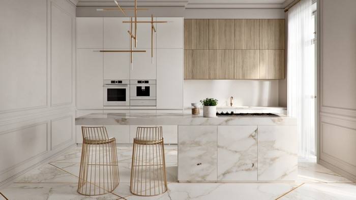 In 2018 we'll be seeing a lot of navy blue, brushed metallic, marble surfaces and greenery in kitchen design