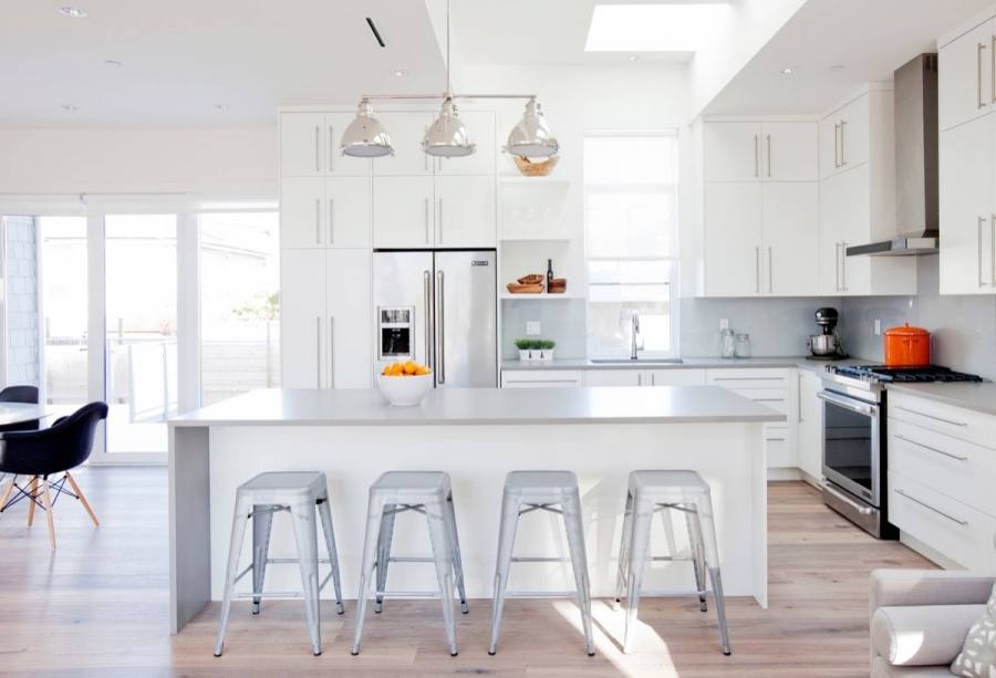 White cabinets and shelves stand out beautifully while a