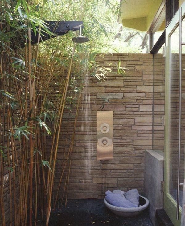 This beach house went with a surf theme for their outdoor shower
