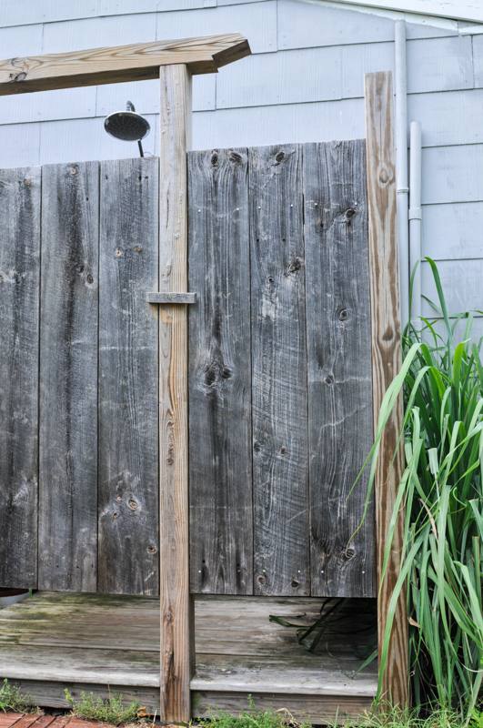 Outdoor shower with separate bathroom