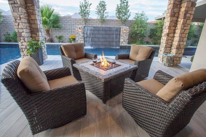 contemporary outdoor living space: Powder coated steel fire pit