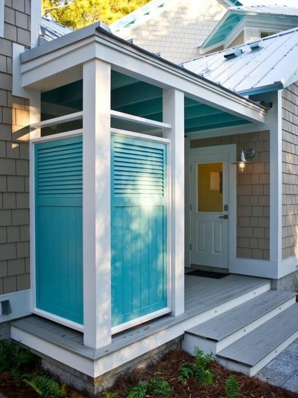 Beach house with outdoor shower with shingles,