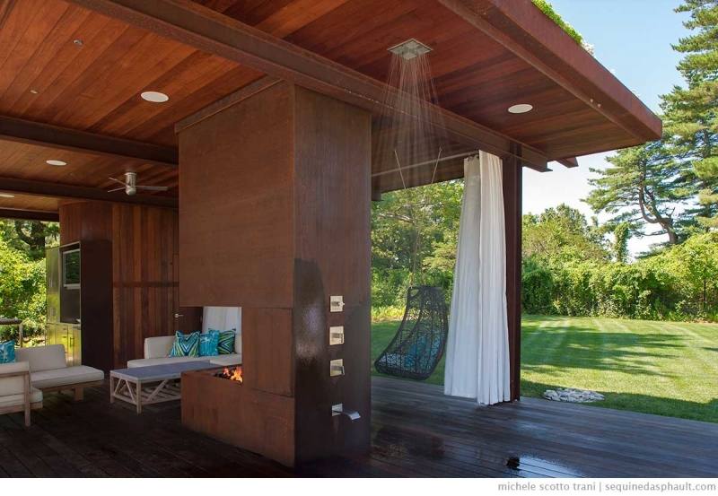 This beach house went with a surf theme for their outdoor shower