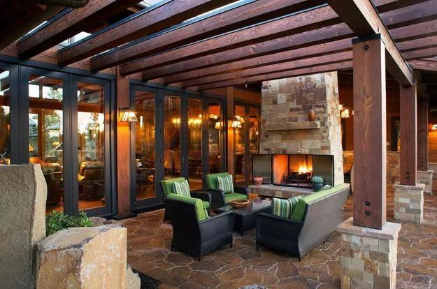 outdoor living room in walnut bend area spaces with pool and fireplace