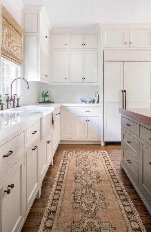 If your home has a vaulted ceiling or if it's just too tall we wouldn't  recommend even attempting running cabinets to the ceiling