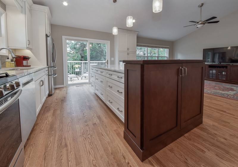 Gray kitchen cabinets with island by Decora Cabinetry