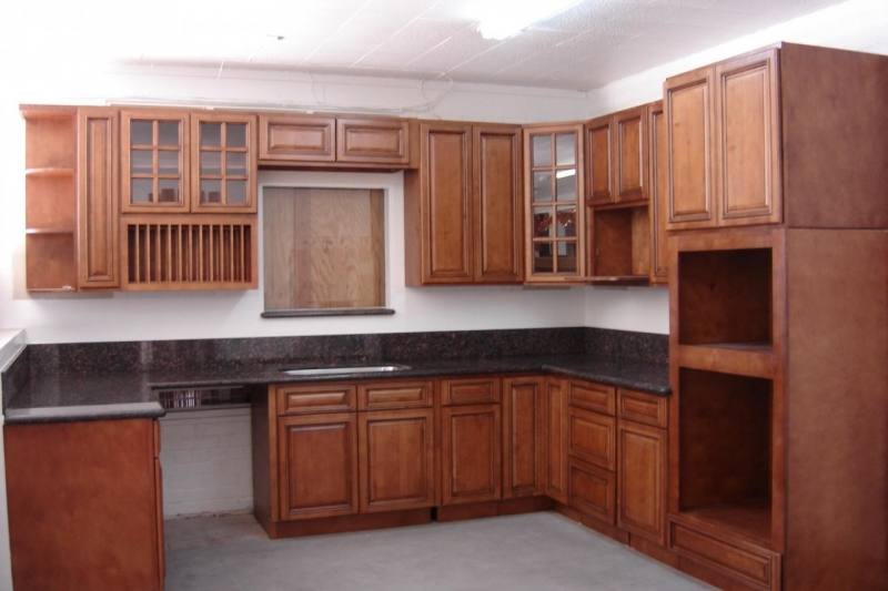 Rustic kitchen with dark Maple stain and off white accents