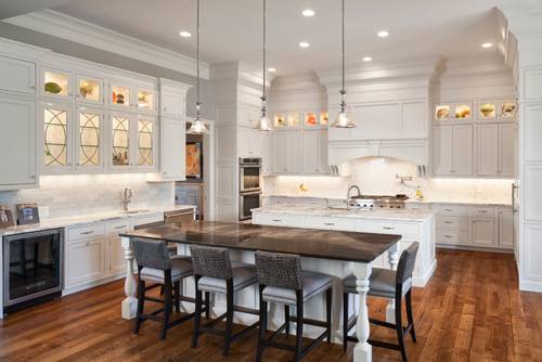 Extend cabinets to ceiling with glass cabinets