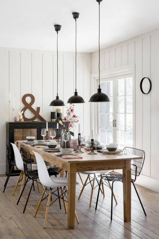 Some of the best decorating ideas for small dining rooms are bold pieces,  like this beautiful chandelier