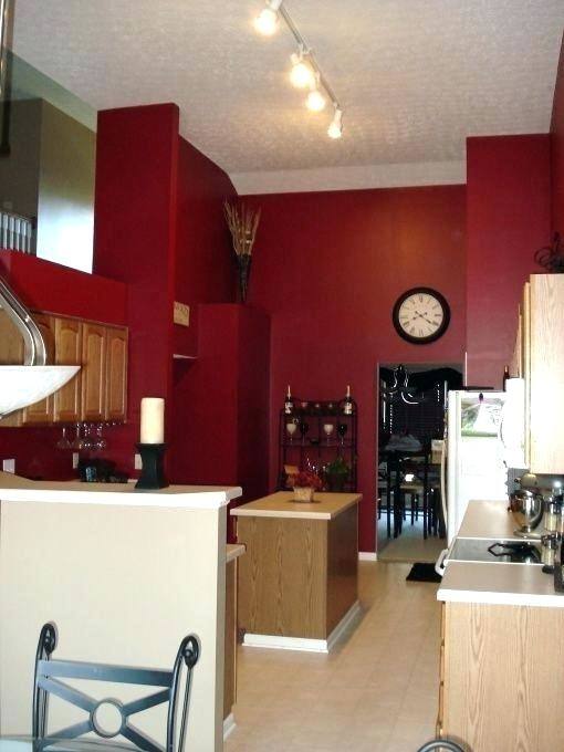 love the black white tile and red walls very dramatic barn kitchen cabinets ideas