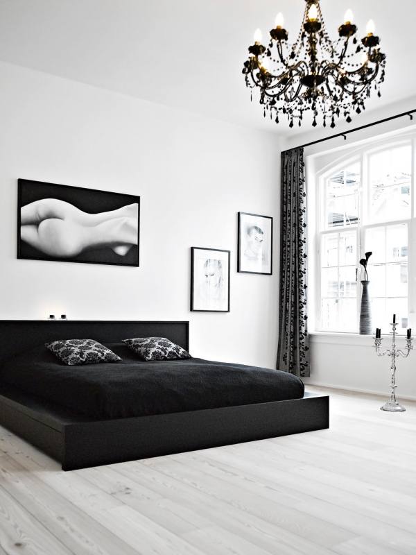 Give your bedroom a modern glam feel by decorating with a black and white color scheme