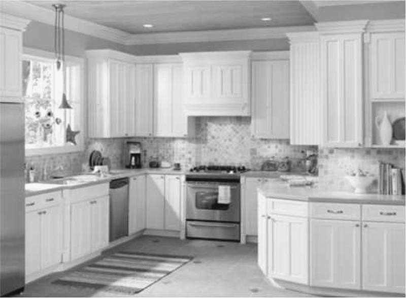 Dark floors,white cabinets, white granite, silver knobs and gray paint wall