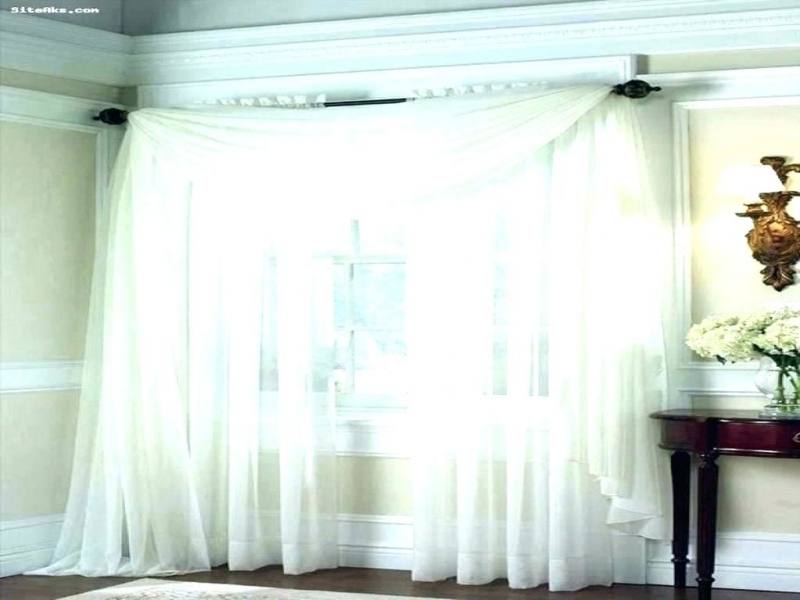 drapes above bed curtains draping over designs canopy curtain bedroom ideas