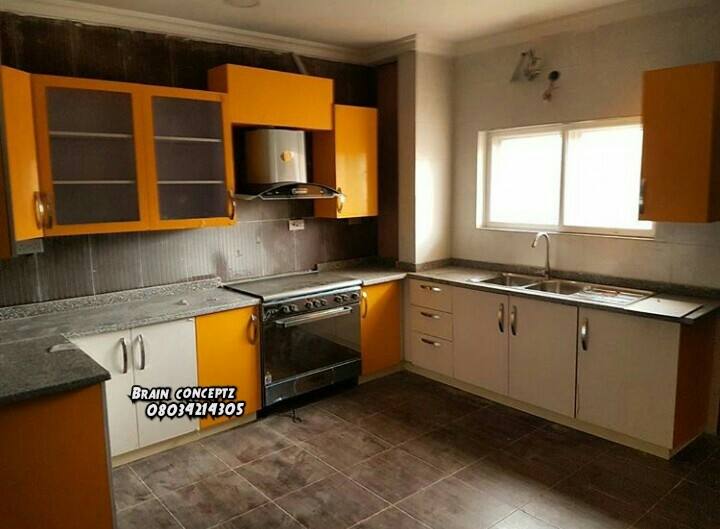 Beautiful kitchen cabinet brown white with island lagos abuja phc nigeria  fela