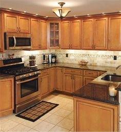 Marvelous Light Caramel Rope Kitchen Cabinets With Black Granite Countertop  Combined With White Subway Tile Backsplash And Simple Pendant Lamps For  Best