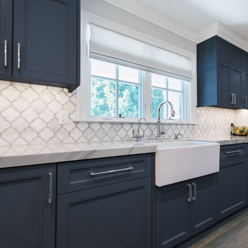 Warm Maple wood cabinets with a white kitchen island