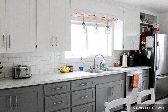 Dark floors,white cabinets, white granite, silver knobs and gray paint  wall