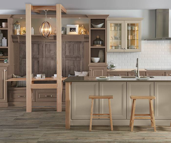 Cherry cabinets with a gray kitchen island