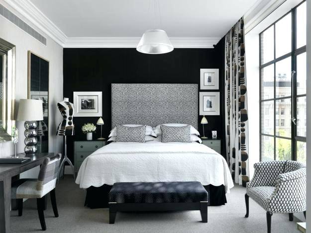 Pair a bold black headboard and black decor with white walls to add lightness to your black bedroom